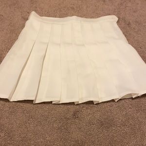 White pleated skirt